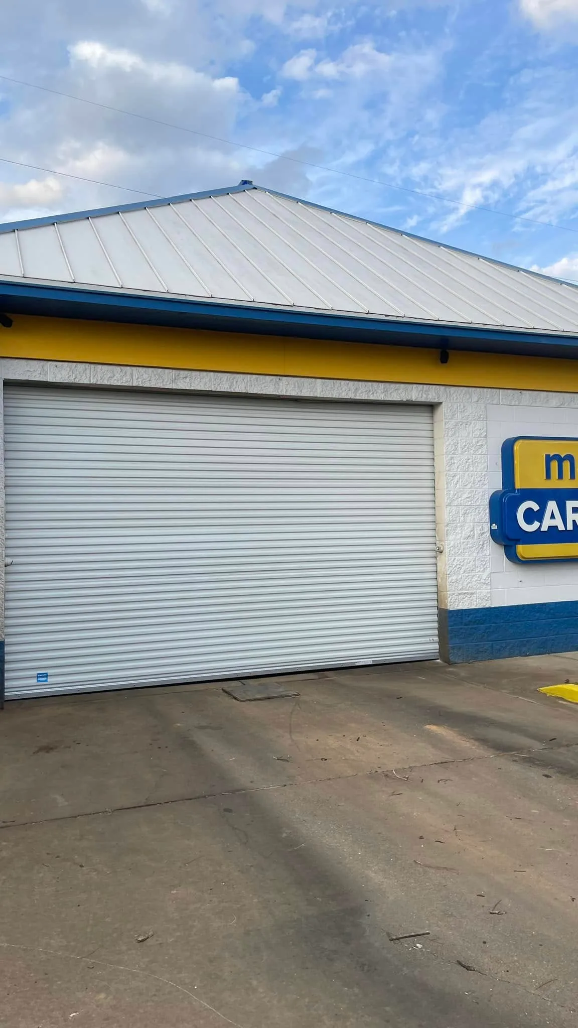 A rolling steel door on a car wash