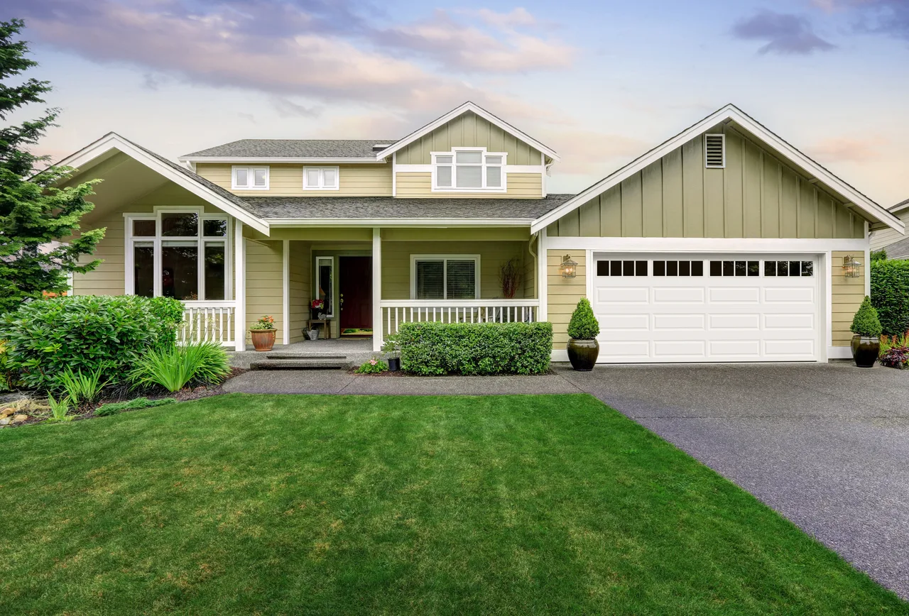 Clopay Classic elegant short door in white with a row of windows
