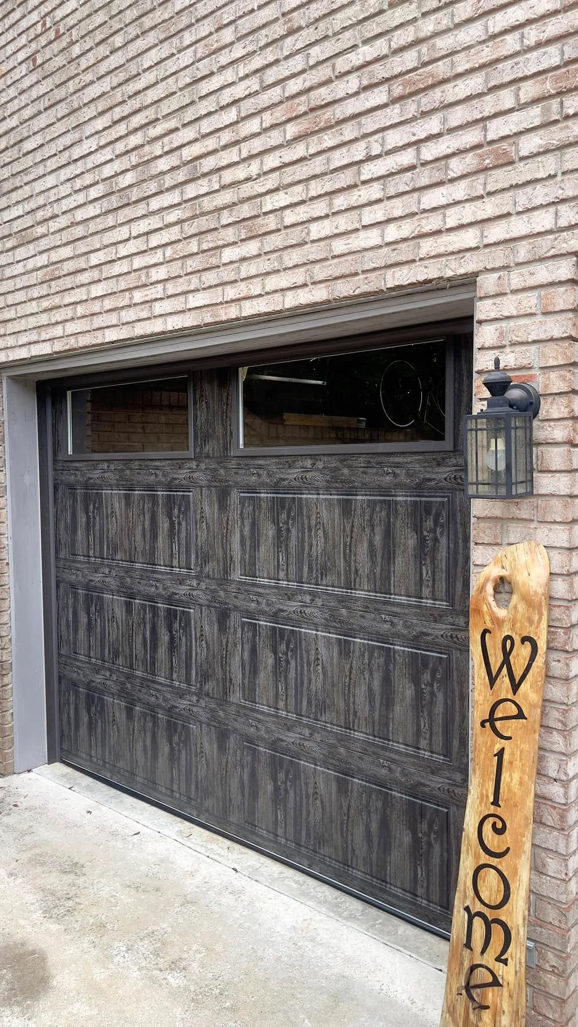 A wood-look door on brick