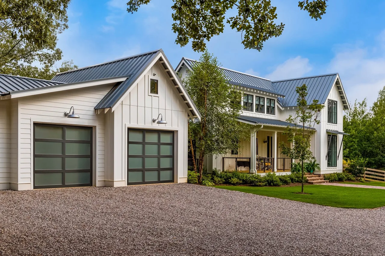 Glass doors on a white farmhouse