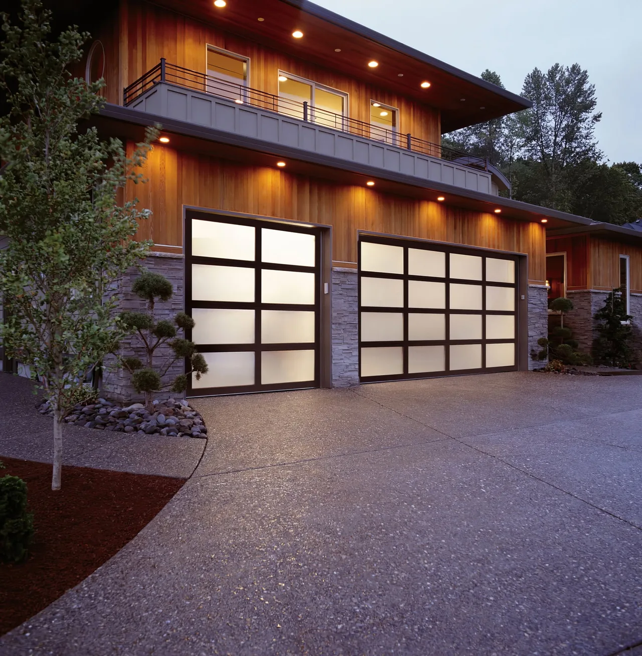 Full-view glass doors at dusk